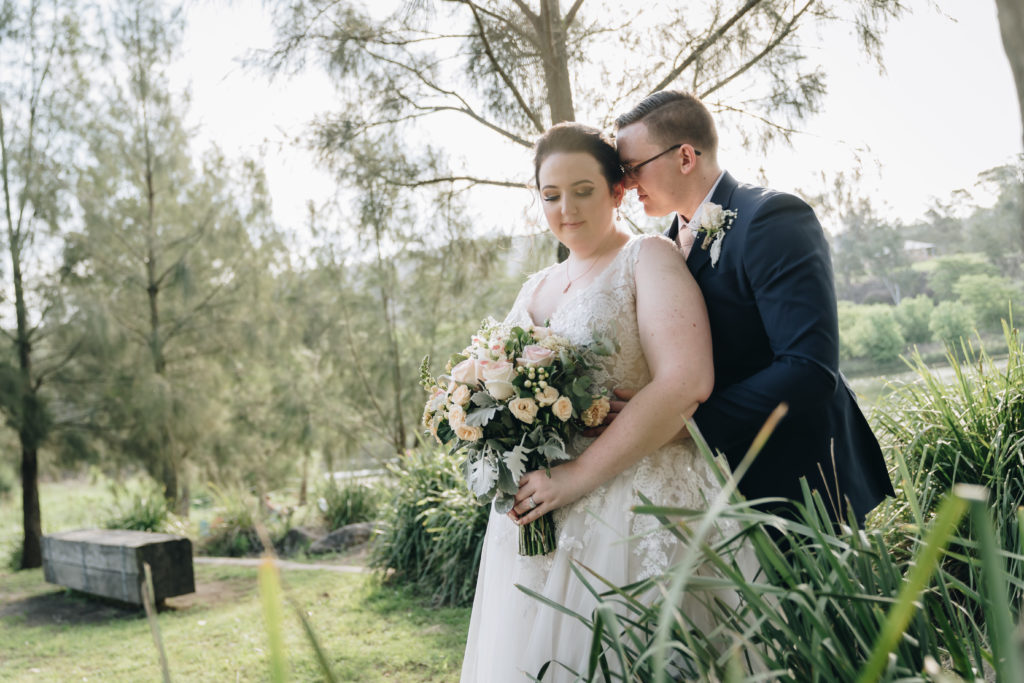 the most beautiful day to be married with luscious green grass.