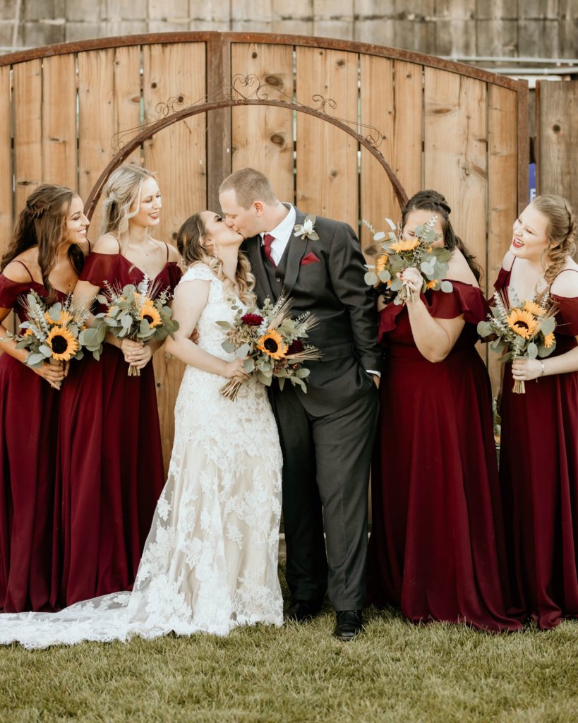 We wanted a rustic theme and with our wedding being in the fall the burgundy went perfect with my favorite flower, Sunflowers.