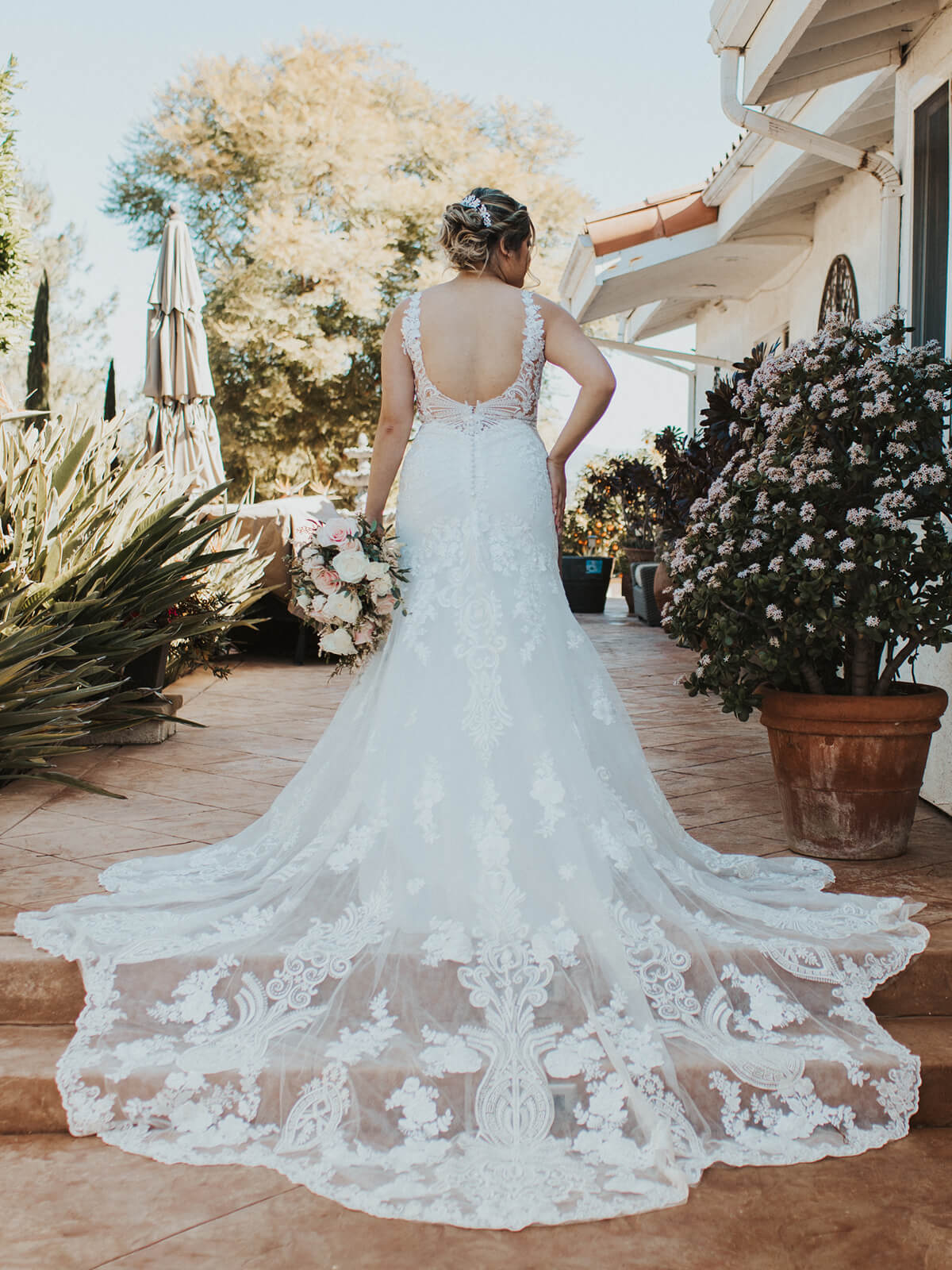 Style Willa's gorgeous lace train + Karina + this gorgeous venue = a recipe for beauty.